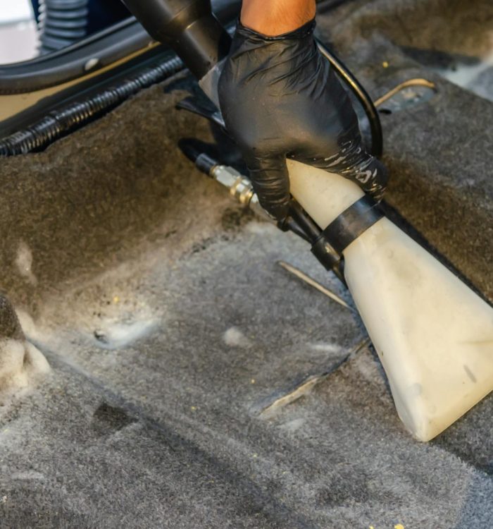 Photo by Khunkorn Laowisit on <a href="https://www.pexels.com/photo/hand-holding-a-car-vacuum-cleaner-5233264/" rel="nofollow">Pexels.com</a>